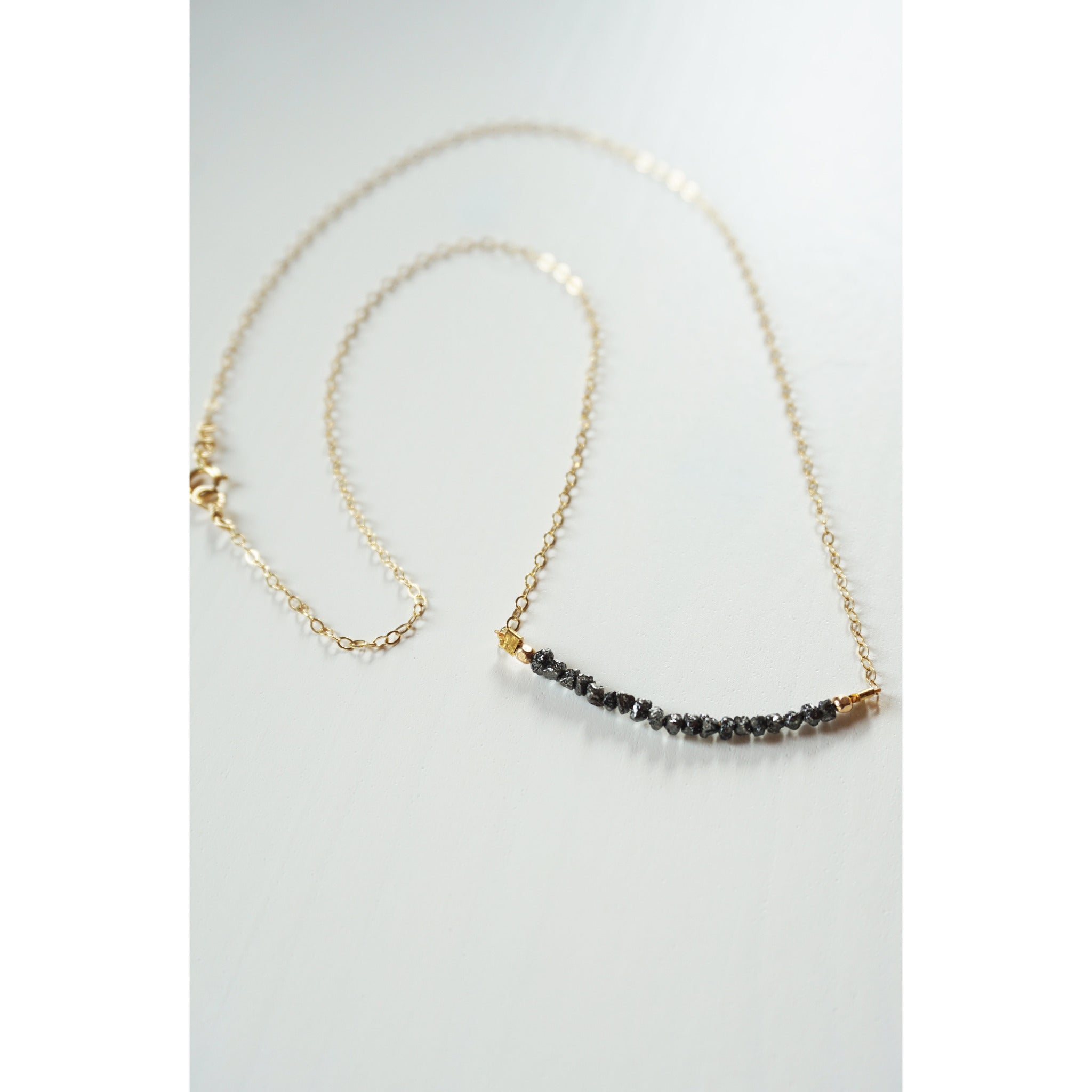 Raw black 2024 diamond necklace